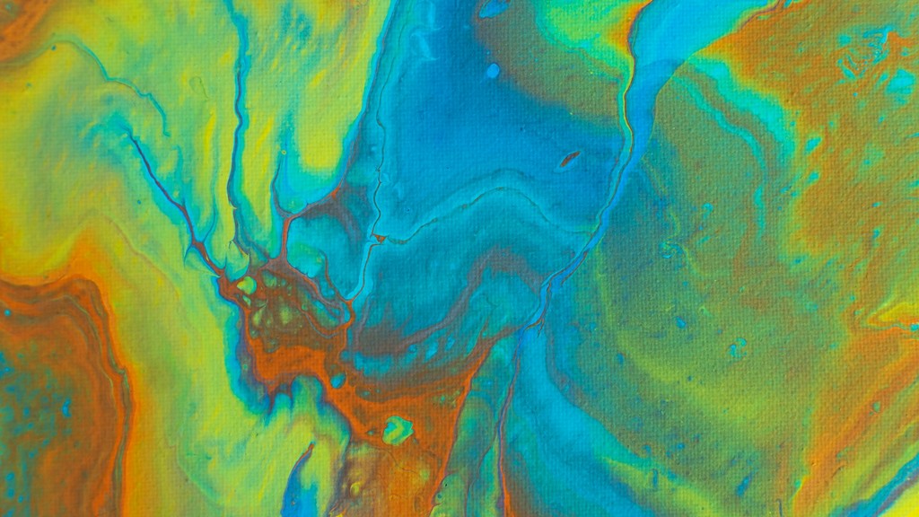 Ineinanderfließende Farben in Blau, Gelb und Orange